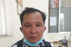 Nguyễn Ngọc Huân tại cơ quan công an.