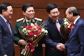 Miễn nhiệm 1 phó thủ tướng và 12 bộ trưởng, trưởng ngành