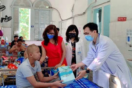  Báo KH&ĐS sôi động các hoạt động vì cộng đồng cuối năm