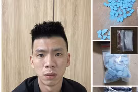 Đối tượng Trần Văn Viện cùng tang vật.