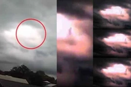 Kỳ quái hình người đứng khổng lồ trên đám mây