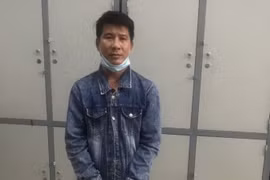 Đối tượng Nguyễn Quốc Tình bị bắt sau gần 15 năm lẩn trốn.