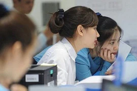 Hàng nghìn nhân viên ngân hàng bị sa thải