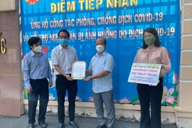 7 tấn gạo đến với hàng trăm hộ dân bị cách ly vì Covid-19 ở quận 8