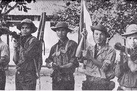 Người phất cờ giải phóng tại Dinh Độc Lập