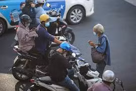 Tái xuất hiện ăn xin tại các giao lộ 