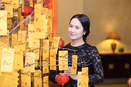 Thanh Thúy đẹp mong manh trong ngày đầu xuân