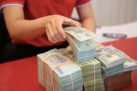 Chính sách tiền tệ sẽ cân bằng hơn, VND sẽ mạnh lên so USD trong 2024