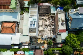 Cận cảnh đổ nát tan hoang vụ sập nhà 4 tầng ở TPHCM