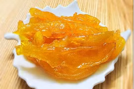 Mứt xoài dẻo chua chua ngọt ngọt mời khách ngày Tết