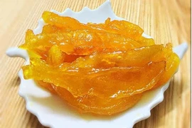 Mứt xoài dẻo chua chua ngọt ngọt mời khách ngày Tết