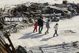 Thành phố Aleppo bình yên trong đổ nát qua ảnh Sputnik