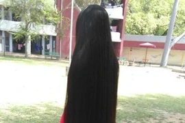 Có một 'Rapunzel' ngoài đời thực với mái tóc dài gần 2 mét suốt 30 năm không cắt