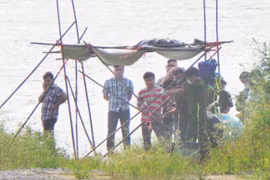 Thi thể mất đầu đã rã nát, không thể nhận ra chị Huyền