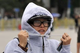 Dân Trung Quốc đón cái lạnh đầu mùa