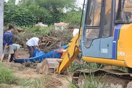 Dân nổi giận vì mồ mả bị san bằng lúc nào không biết