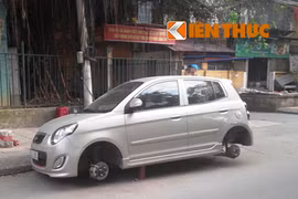 Kia Morning bị trộm vặt cả 4 bánh ở Hà Nội