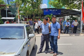 Lý lúc bị công an bắt giữ.