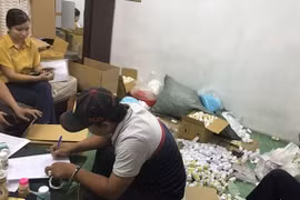 Công an thu giữ lượng lớn tang vật.