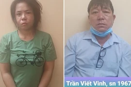 Thơm và Vinh tại cơ quan công an