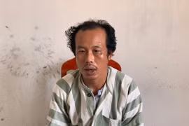 Tuấn tại cơ quan công an. 