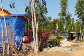 Người thân tổ chức tang lễ cho anh Q..