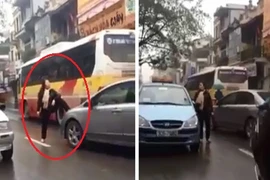 Quý cô vênh mặt đạp đầu ô tô giữa đường HN
