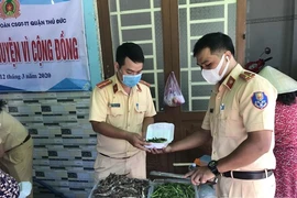 CSGT Công an quận Thủ Đức chung tay mở quán cơm 3.000 đồng giúp người nghèo