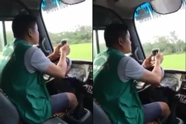 Thót tim tài xế xe buýt vừa dùng khuỷu tay lái xe băng băng vừa lướt điện thoại