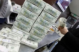 Ngân hàng Nhà nước đang “đỡ” tỷ giá USD/VND