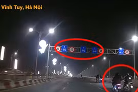 Nhóm thanh niên đầu trần, đánh võng trên làn ô tô cầu Vĩnh Tuy