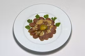 Lạp xưởng sốt quất, món ăn vô cùng hấp dẫn