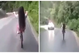 Không dám nhìn cảnh gái trẻ bốc đầu xe đạp khi xuống dốc