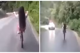 Không dám nhìn cảnh gái trẻ bốc đầu xe đạp khi xuống dốc