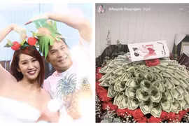 Thuý Ngân được tặng bó hoa toàn tiền đô, fan gọi tên Trương Thế Vinh