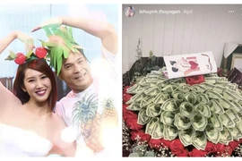 Thuý Ngân được tặng bó hoa toàn tiền đô, fan gọi tên Trương Thế Vinh