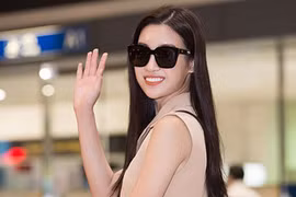 Đỗ Mỹ Linh rạng rỡ về nước trong đêm khuya cùng bố mẹ