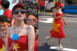 Cô gái dùng cờ Tổ quốc quấn ngang hông nói gì?