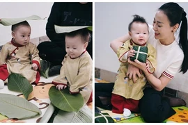 Phương Oanh khoe hai con diện áo dài ngồi xem gói bánh chưng