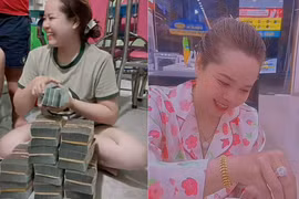 Chị gái đang bán hàng thì tự nhiên dò số trúng độc đắc