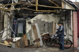 Đạn pháo vẫn rền vang ở Donetsk bất chấp lệnh ngừng bắn