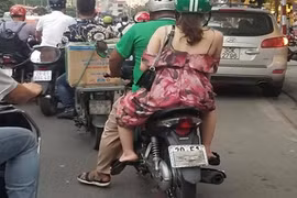 Xe máy đeo khẩu trang biển số: Đội xe ôm kỳ lạ tung hoành 