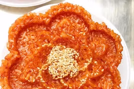 Bí quyết nấu xôi gấc lên màu đẹp, thơm dẻo cúng Tất niên