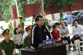 Giám đốc rút súng dọa tài xế ở Bắc Ninh lĩnh án 18 tháng tù