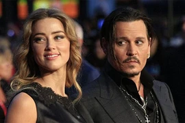 Johnny Depp và Amber Heard chia tài sản sau ly hôn