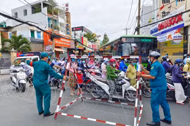 Nhóm đối tượng nào được phép ra ngoài đường khi TP. HCM “nâng mức” giãn cách?