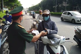 Công an Hà Nội cấp, kiểm tra giấy đi đường có nhận diện qua mã QR Code