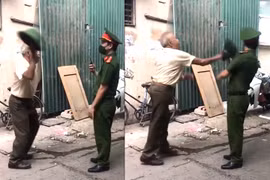 Xử phạt cụ ông 79 tuổi dùng mũ cối đánh công an