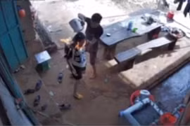 Chồng đổ xăng đốt vợ đang mang bầu