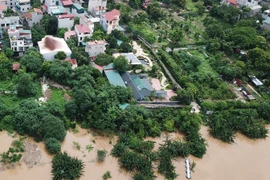 Hà Nội: Loạt công trình xây dựng trái phép trên đất bãi bồi sồng Hồng giờ ra sao?